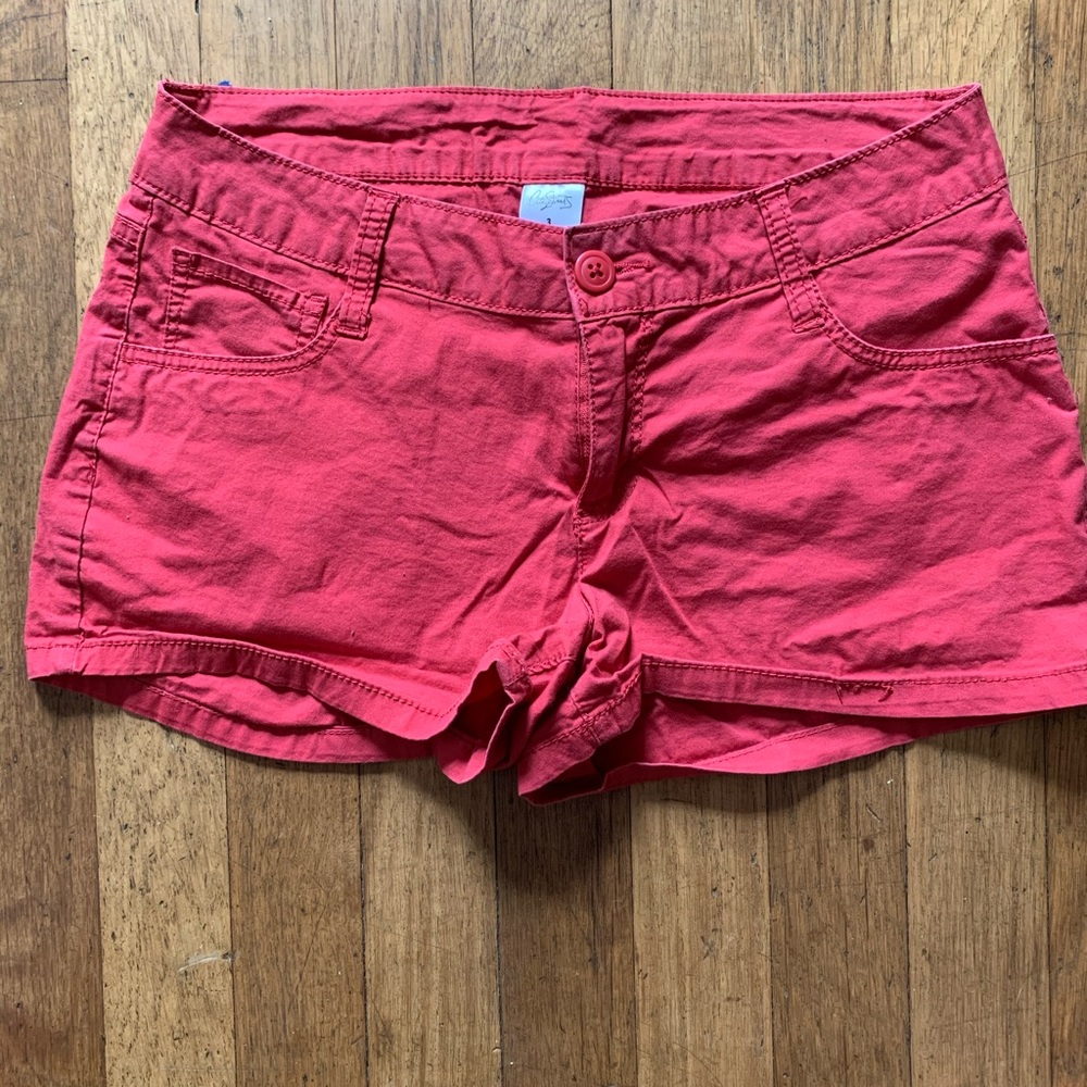 No longer fit, pink/red/dark salmon.